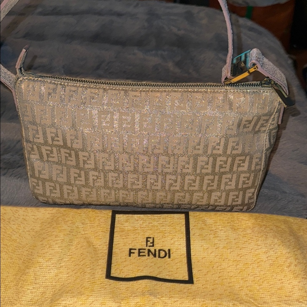 Preloved Fendi Beige zucchino monogram shimmer canvas great condition dust bag.
